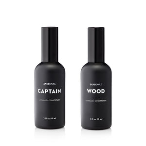 captain and wood aromatic concentrate spray mist. natural linen spray, heritage men’s fragrance. cedarwood, lavender, oak moss, fir needle essential oil blend. Presented in 3 ounce black glass bottles.